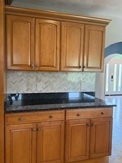 713 Bradgate Drive Irwin, PA 15642 - Photo 6 of 35 a kitchen with granite countertop cabinets and black appliances