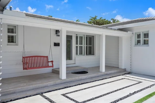 a front view of a house with a porch