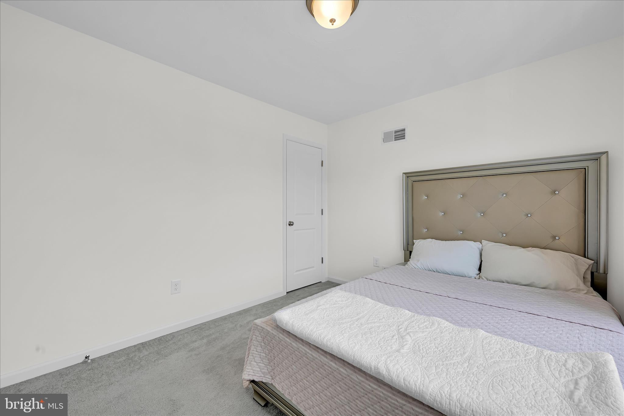 2625 Village Road Dover, PA 17315 - Photo 7 of 15 a bedroom with a bed and a window