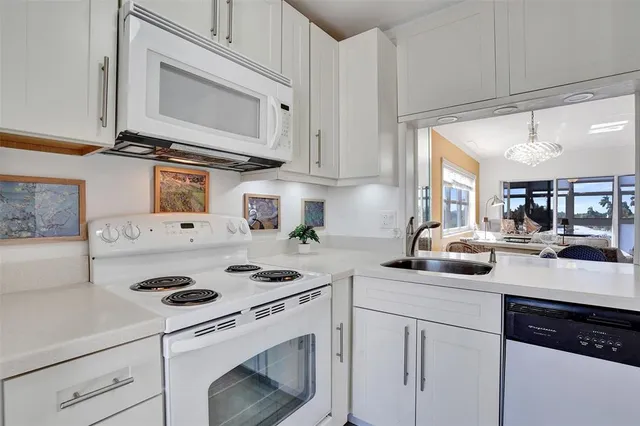 a view of a dining room and livingroom