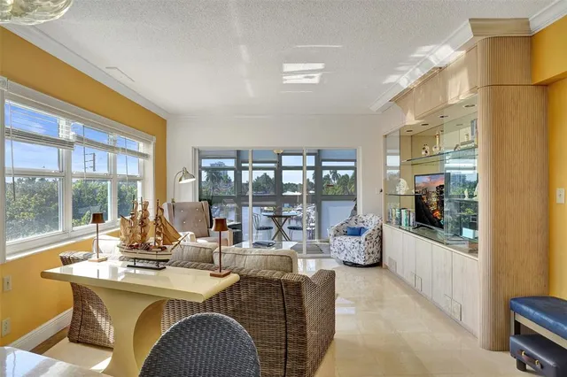 a kitchen with cabinets appliances and a counter space