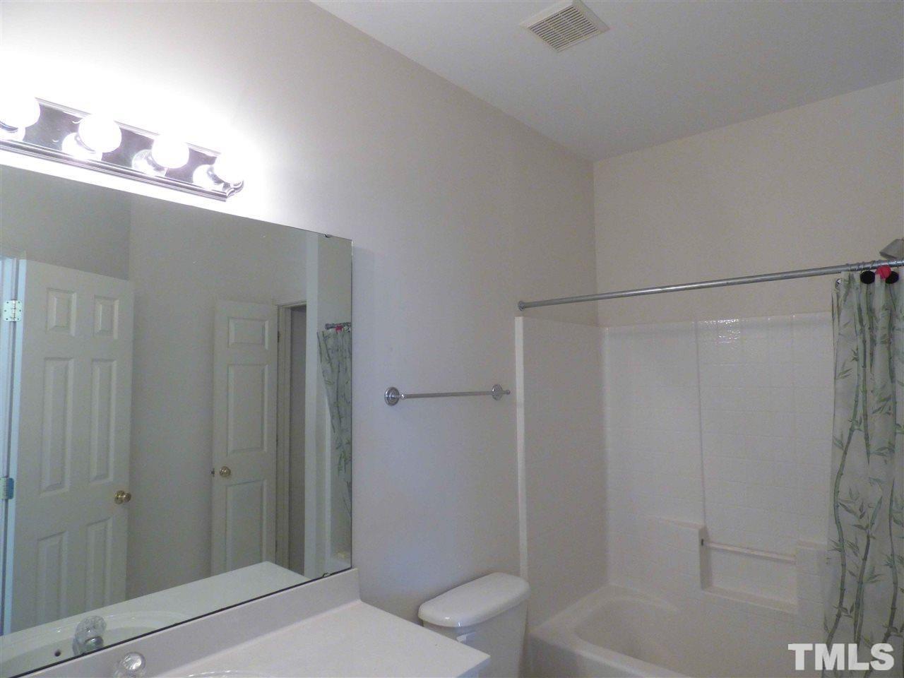 110 North Fields Circle Chapel Hill, NC 27516 - Photo 20 of 24 a bathroom with a sink a toilet and shower