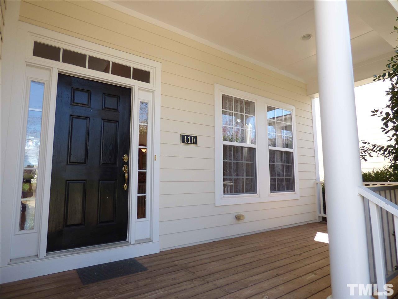 110 North Fields Circle Chapel Hill, NC 27516 - Photo 2 of 24 a view of a brick house with wooden floor and windows