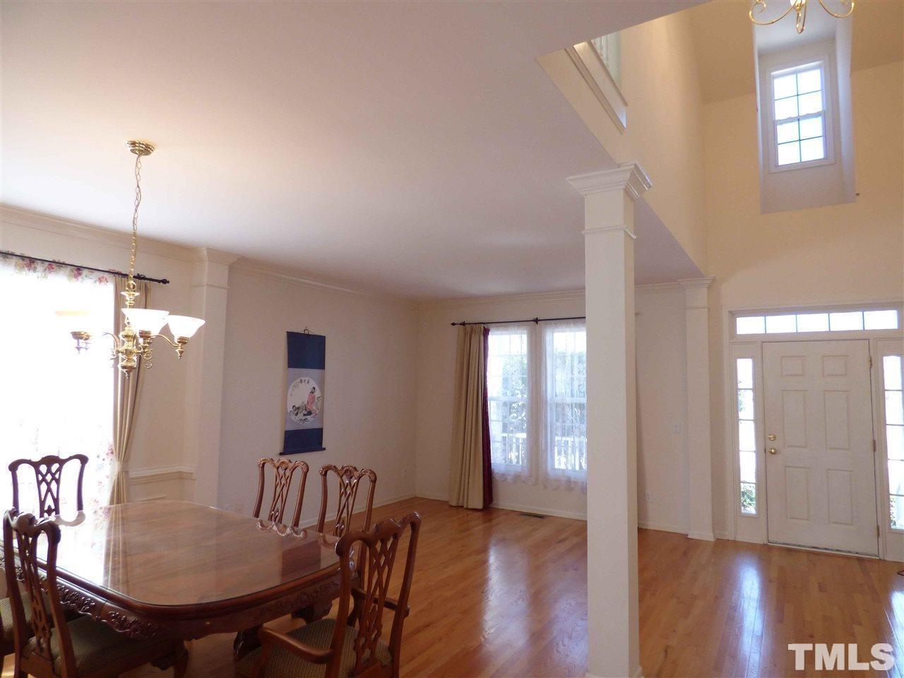 110 North Fields Circle Chapel Hill, NC 27516 - Photo 4 of 24 a view of a livingroom with furniture window and wooden floor