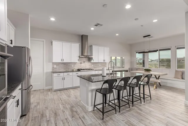 a view of an house with backyard porch and sitting area