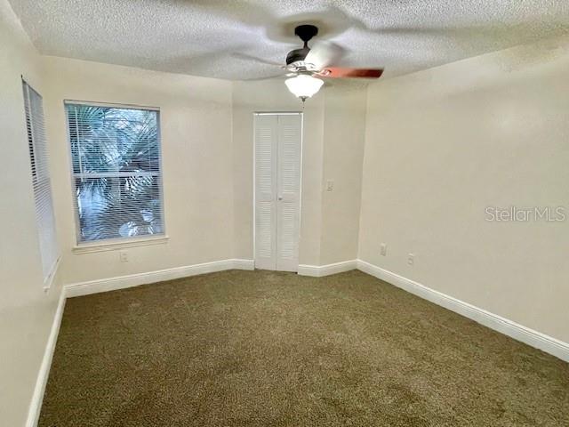 717 Secret Harbor Lane, Unit 309 Lake Mary, FL 32746 - Photo 16 of 20 a view of an empty room with a window