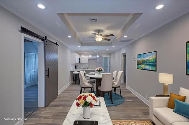 a view of a dining room with furniture
