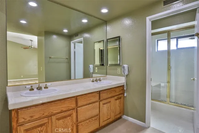 a view of a porch with a table and chairs