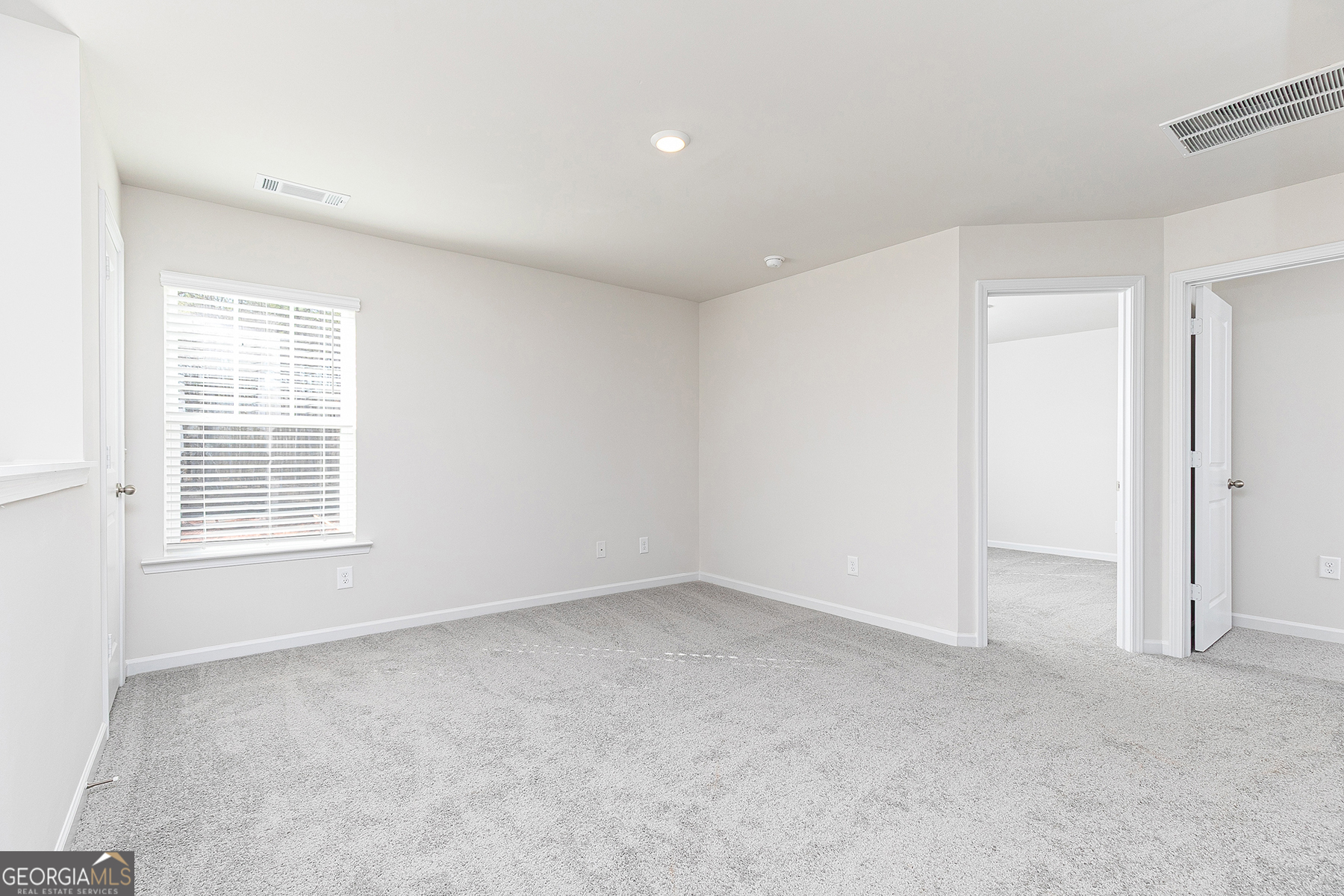 642 Mackenzie Cove Villa Rica, GA 30180 - Photo 11 of 17 an empty room with a window