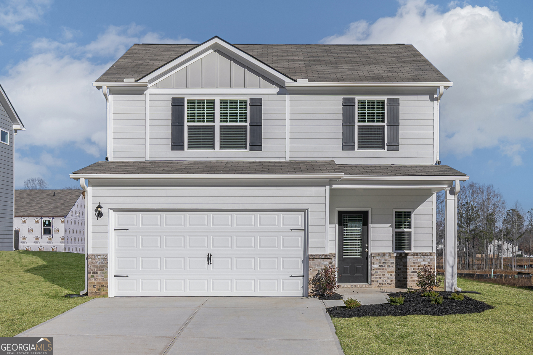 642 Mackenzie Cove Villa Rica, GA 30180 - Photo 2 of 17 front view of a house with a yard