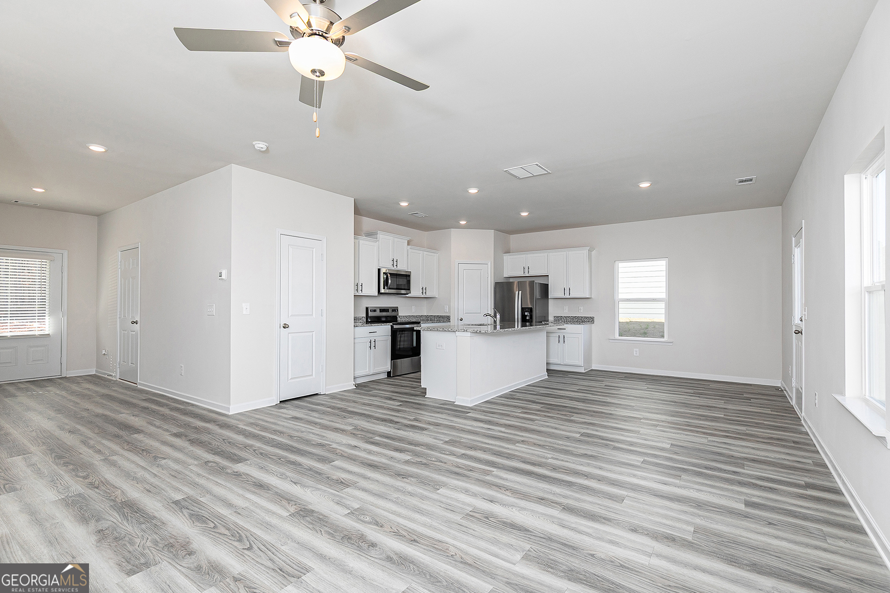 642 Mackenzie Cove Villa Rica, GA 30180 - Photo 6 of 17 a view of kitchen cabinet and refrigerator