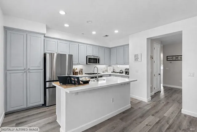 a bathroom with a toilet and a sink