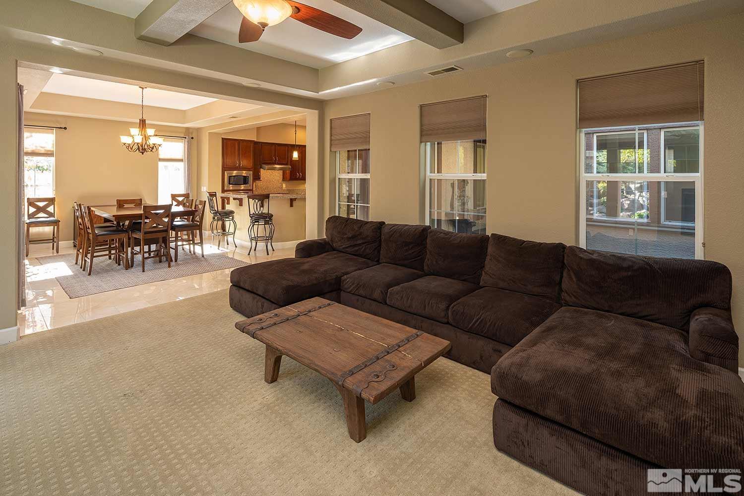 1861 Braemore Drive Reno, NV 89521 - Photo 11 of 40 a living room with furniture and a large window