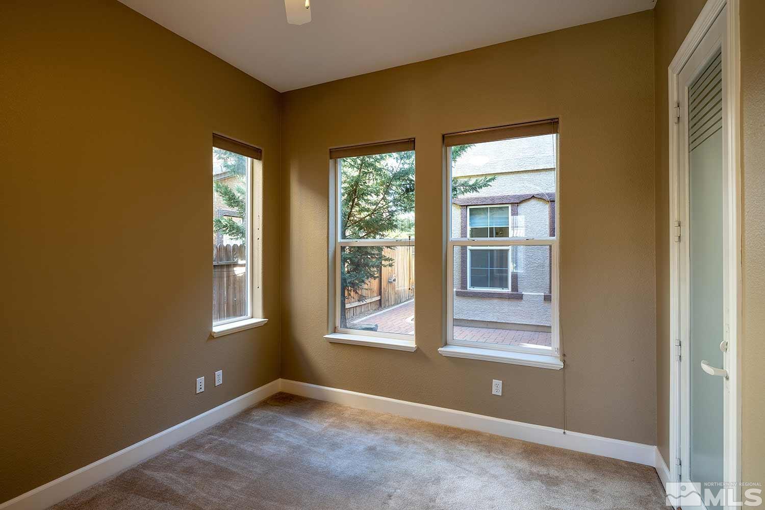 1861 Braemore Drive Reno, NV 89521 - Photo 19 of 40 a view of an empty room with a window