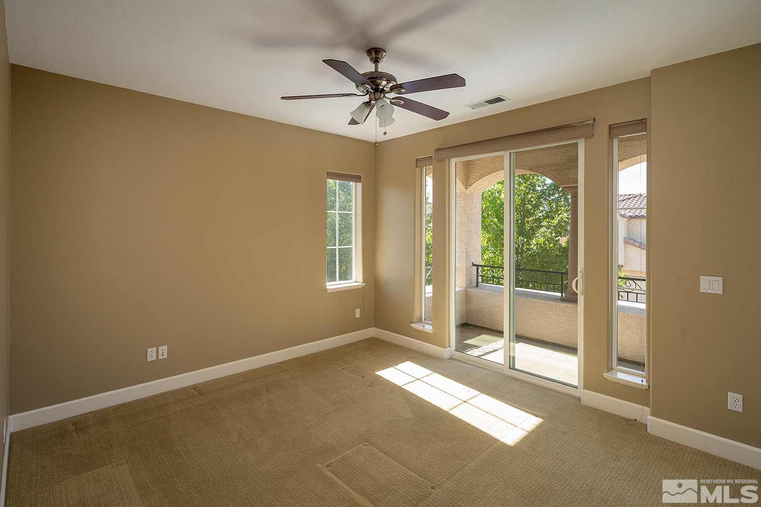 1861 Braemore Drive Reno, NV 89521 - Photo 21 of 40 a view of a livingroom with a ceiling fan and window