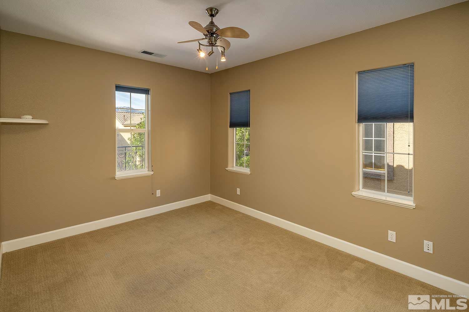 1861 Braemore Drive Reno, NV 89521 - Photo 27 of 40 a view of an empty room with a window