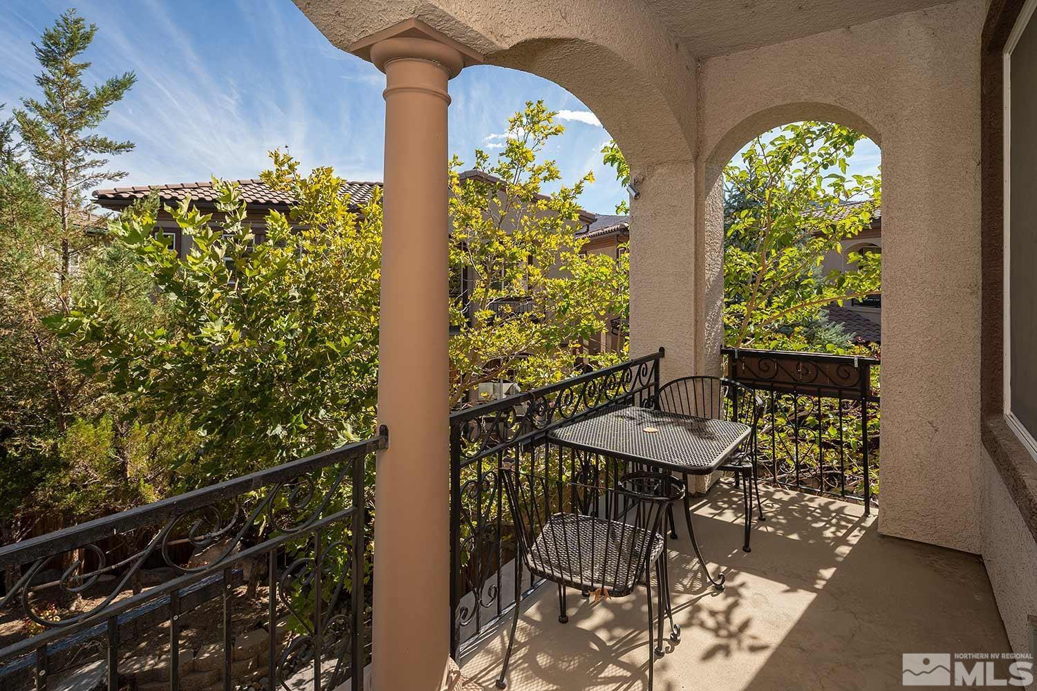 1861 Braemore Drive Reno, NV 89521 - Photo 34 of 40 a view of a balcony with chairs and table