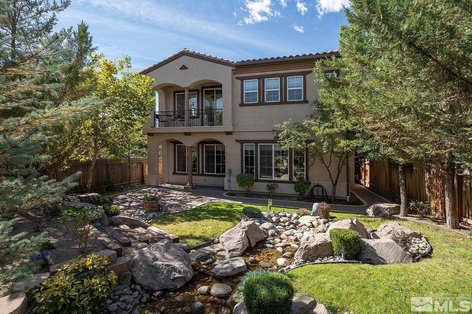 1861 Braemore Drive Reno, NV 89521 - Photo 39 of 40 a front view of a house with garden