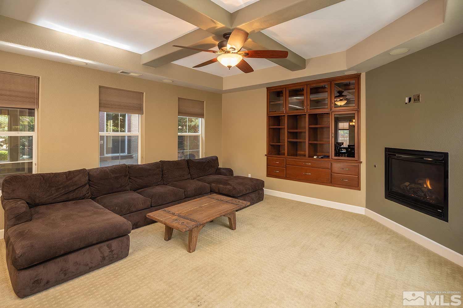 1861 Braemore Drive Reno, NV 89521 - Photo 10 of 40 a living room with furniture and a fireplace