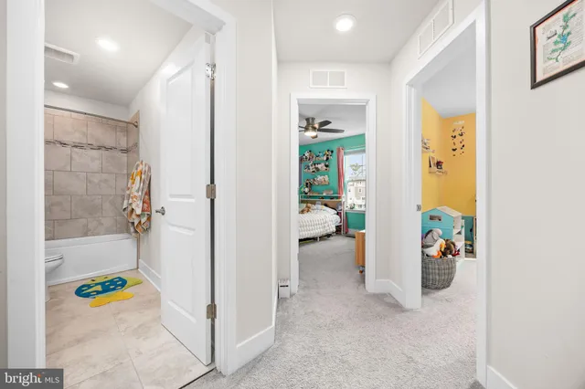 a view of residential house with outdoor space and lake