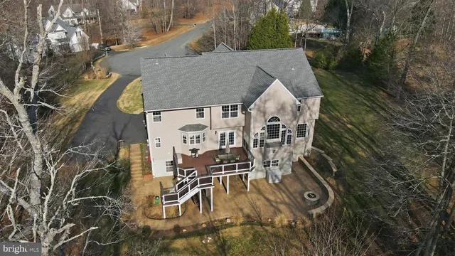 an aerial view of a house with outdoor space sitting space