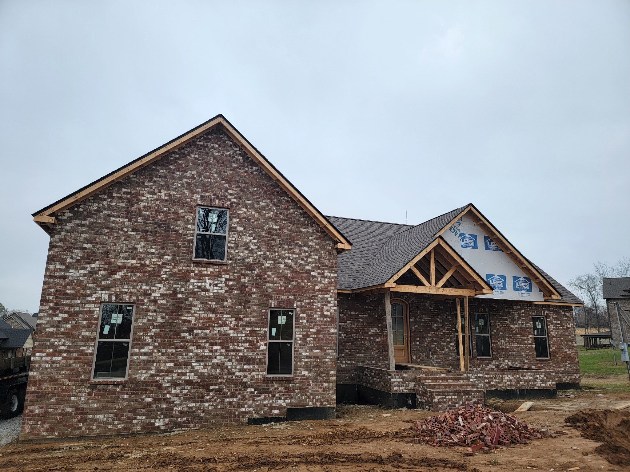 a front view of a house with yard