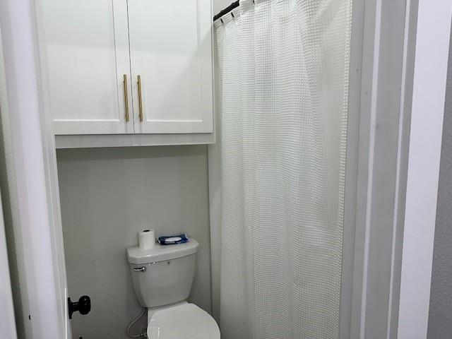 351 Mesa Ridge Decatur, TX 76234 - Photo 18 of 29 Bathroom with a shower with curtain