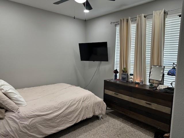 351 Mesa Ridge Decatur, TX 76234 - Photo 19 of 29 Bedroom featuring carpet flooring and ceiling fan