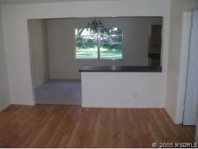 568 Lambright Road Daytona Beach, FL 32119 - Photo 2 of 6 an empty room with a window