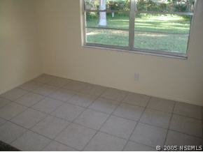 568 Lambright Road Daytona Beach, FL 32119 - Photo 4 of 6 a view of empty room with window