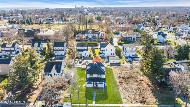 an aerial view of a city with lots of residential buildings