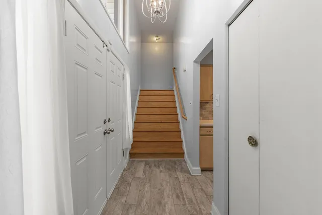 a view of a hallway view with staircase