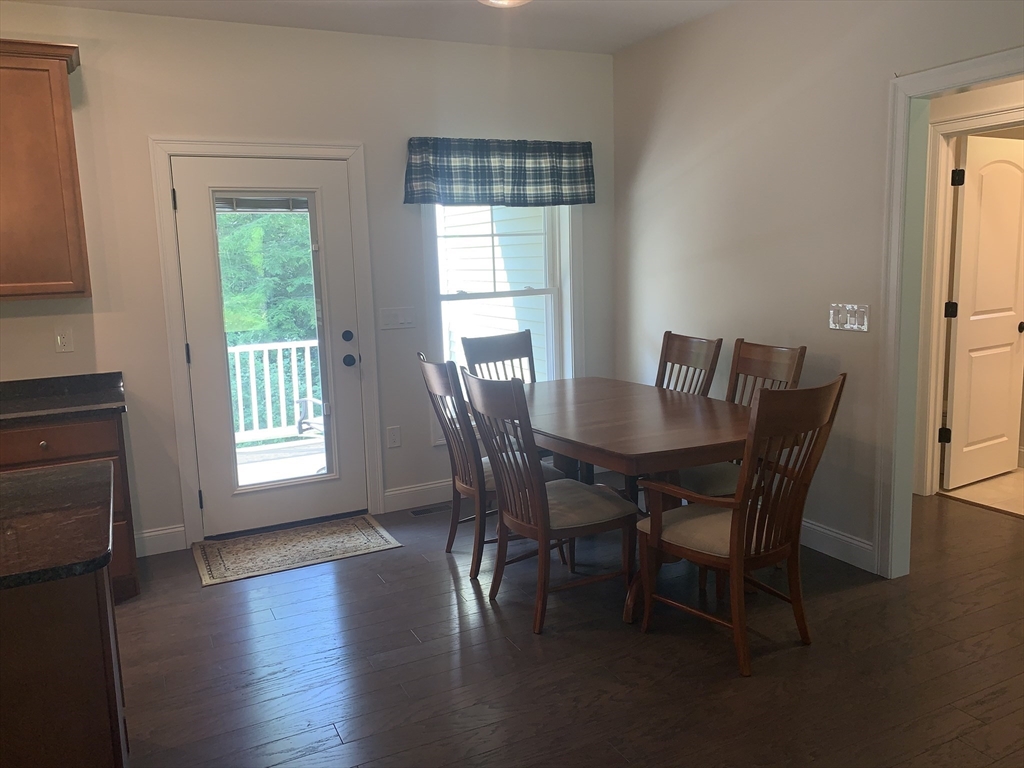 170 Pratt Pond Road Mason, NH 03048 - Photo 13 of 31 a view of a dining room with furniture and window