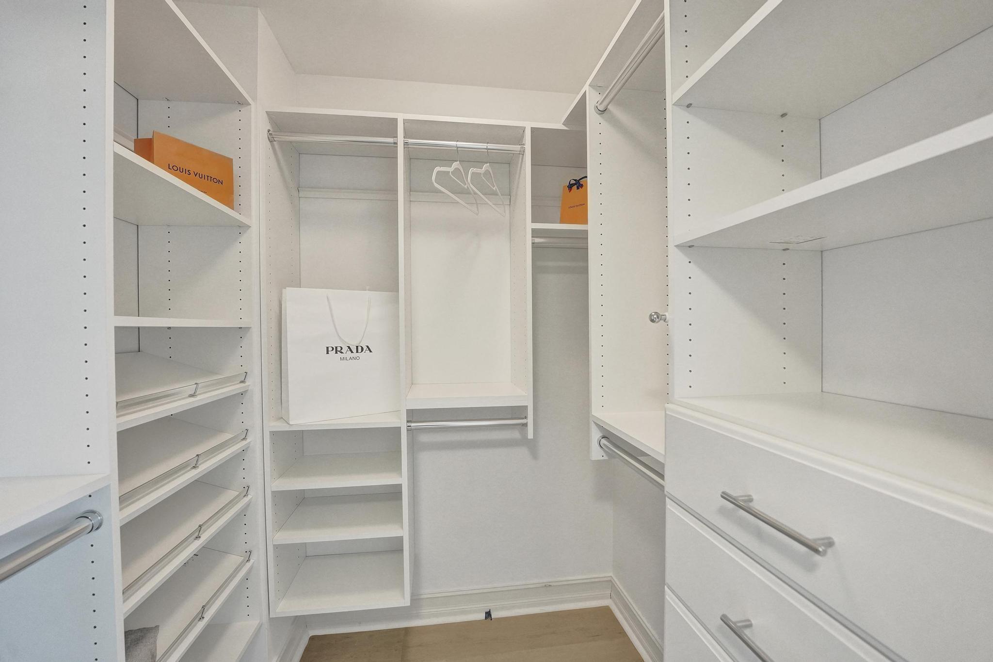 99 Southeast Mizner Boulevard, Unit 719 Boca Raton, FL 33432 - Photo 13 of 30 Primary Bedroom Closet