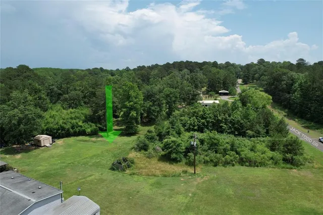 a view of a yard with an outdoor space