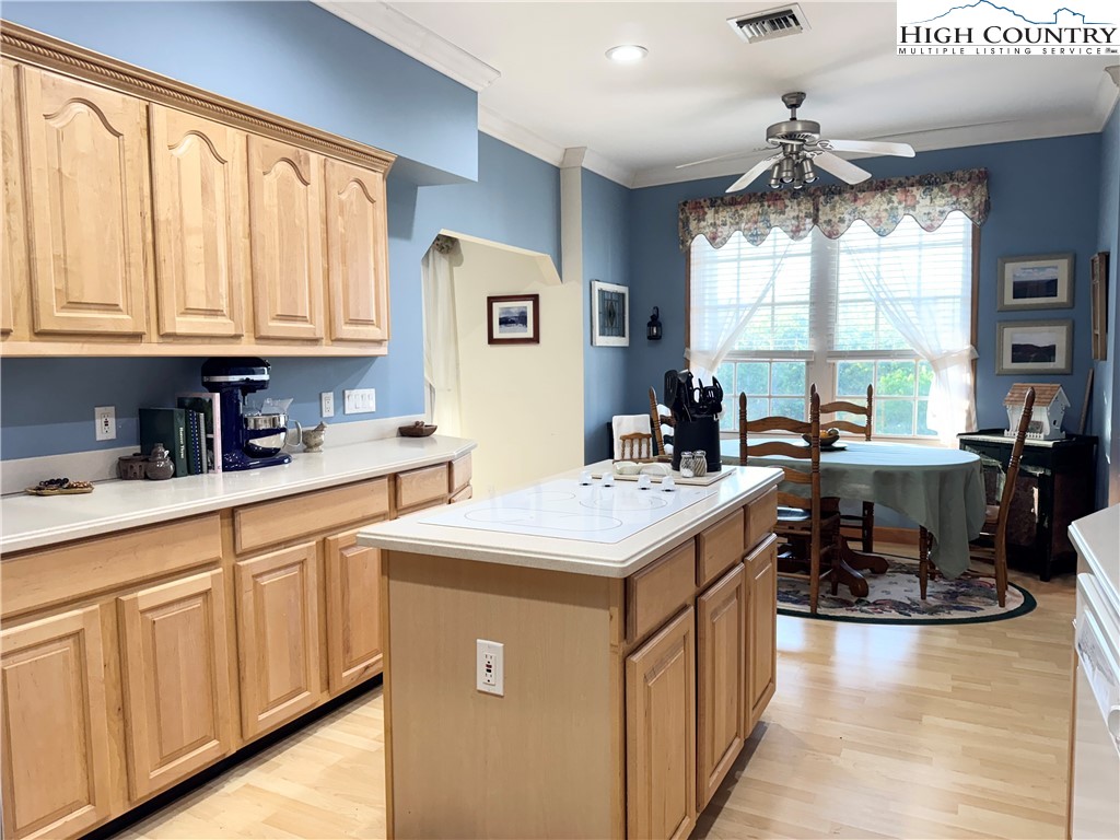 175 Olive Ridge Drive Crumpler, NC 28617 - Photo 20 of 50 a kitchen that has a lot of cabinets in it and a large window