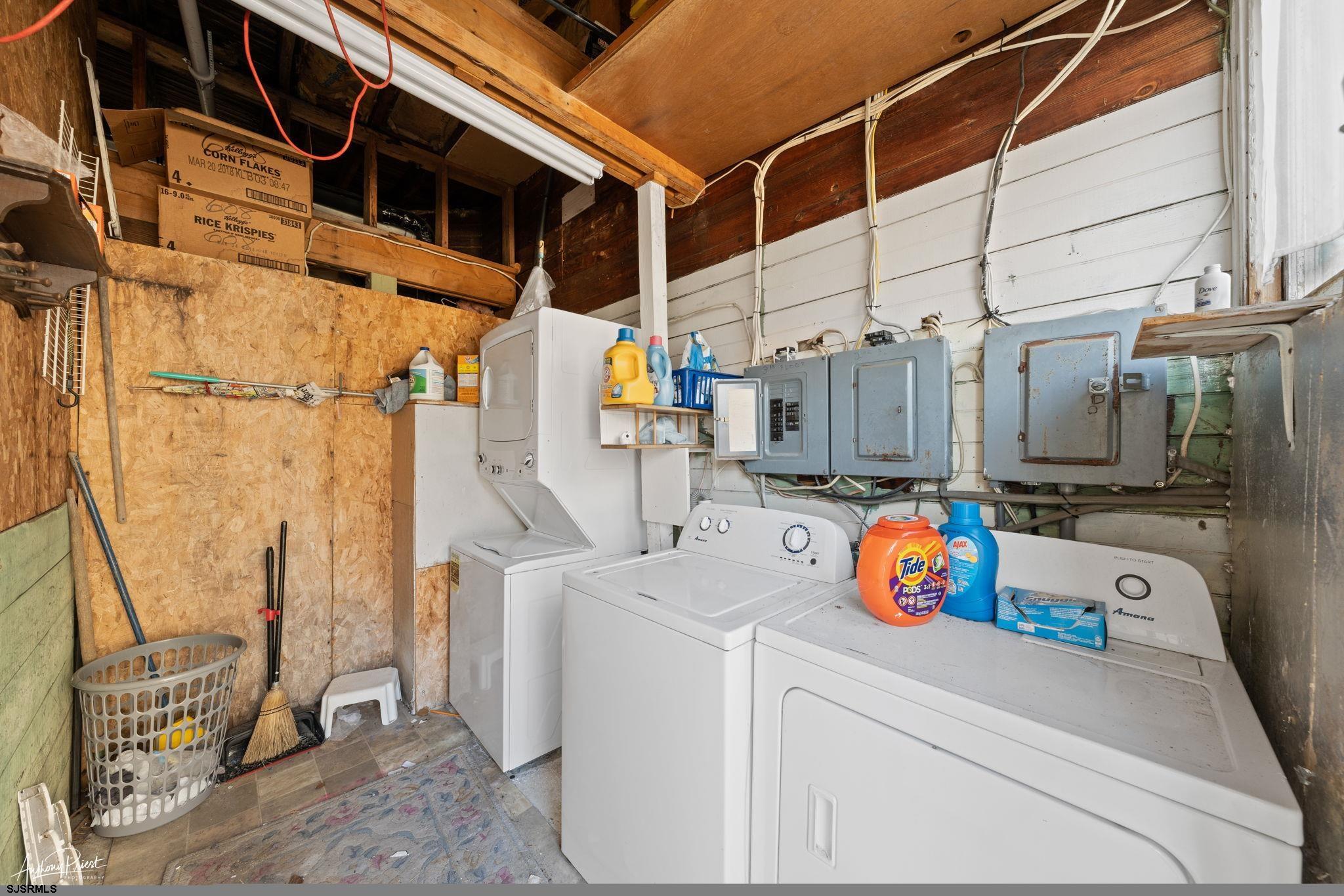 608 1st Street, Unit 3 Ocean City, NJ 08226 - Photo 12 of 13 a utility room with dryer and washer