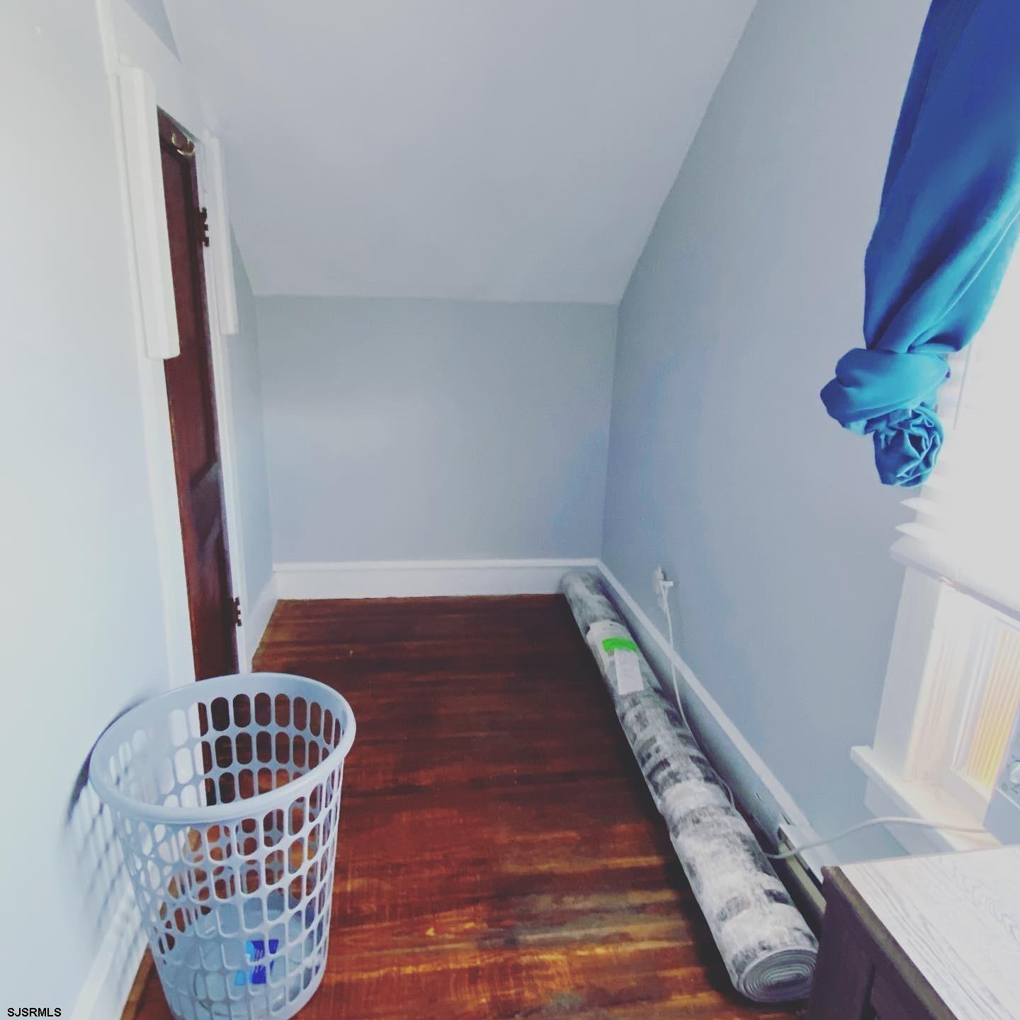 608 1st Street, Unit 3 Ocean City, NJ 08226 - Photo 8 of 13 a view of entryway with wooden floor