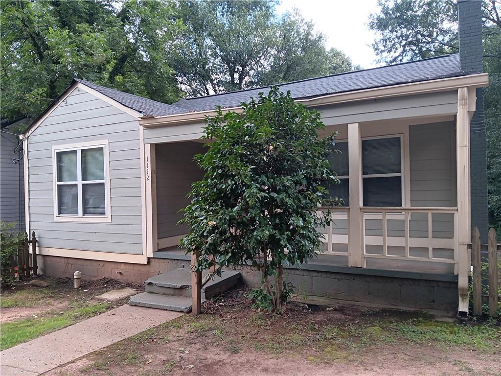 1112 Regent Street Southwest, Unit 1 Atlanta, GA 30310 - Photo 1 of 20 a small white house with a outdoor space