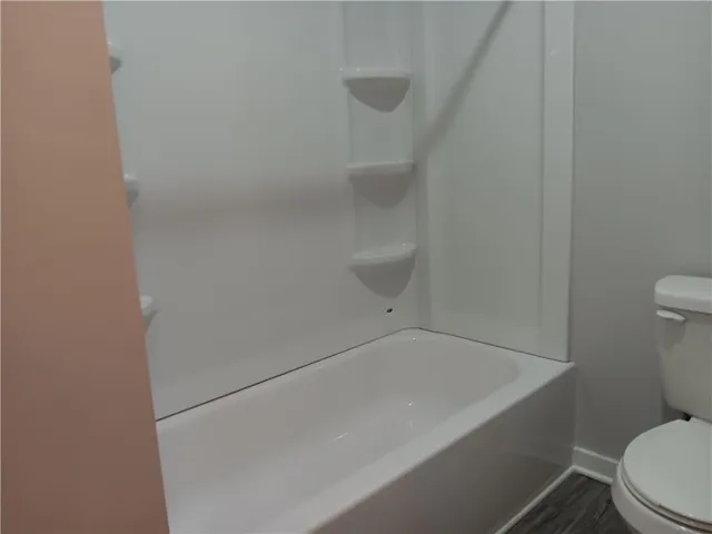 a bathroom with a bathtub