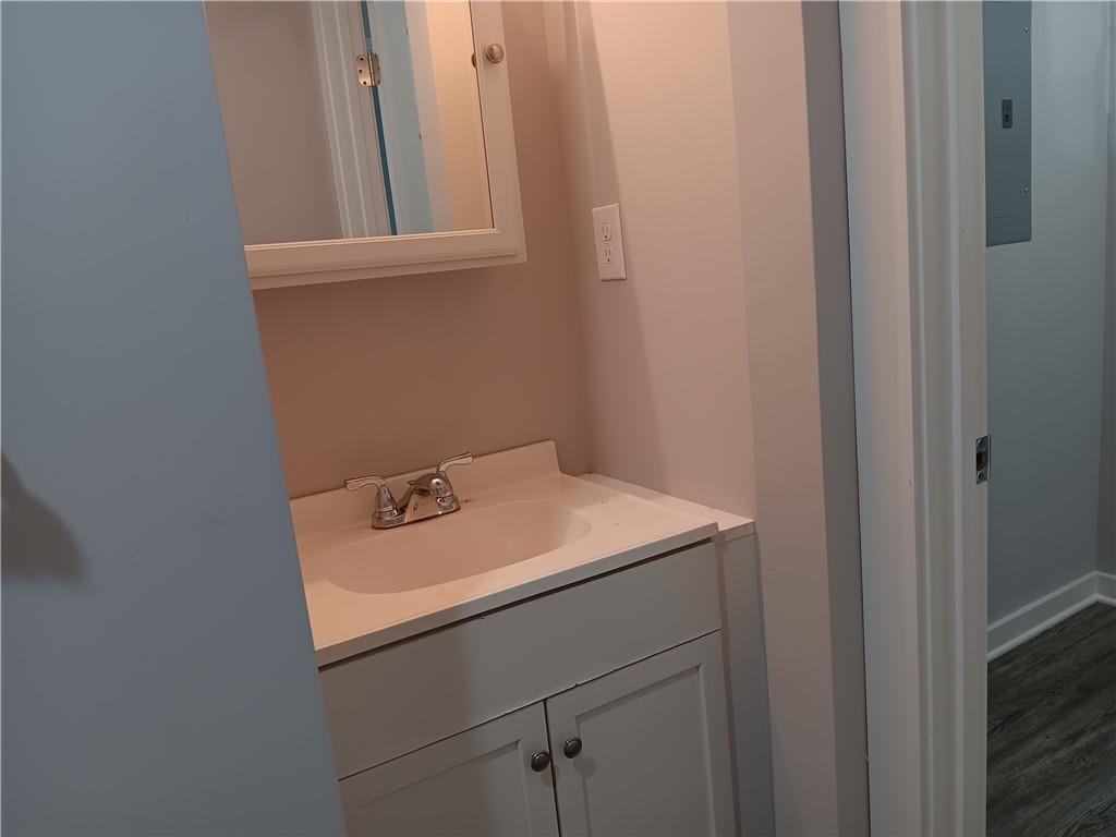 1112 Regent Street Southwest, Unit 1 Atlanta, GA 30310 - Photo 15 of 20 a bathroom with a sink and a vanity