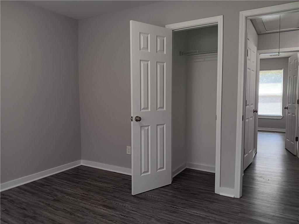 1112 Regent Street Southwest, Unit 1 Atlanta, GA 30310 - Photo 17 of 20 an empty room with wooden floor & closet area