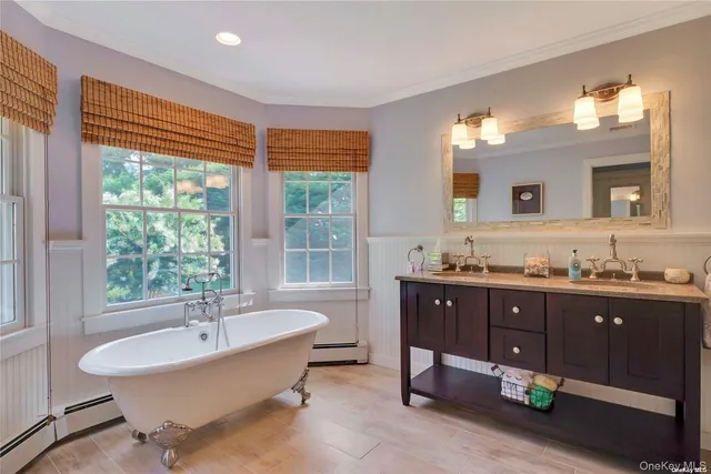 a view of a kitchen with kitchen island a counter tops and a window