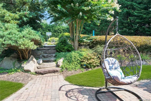 a outdoor living space with furniture and a potted plant