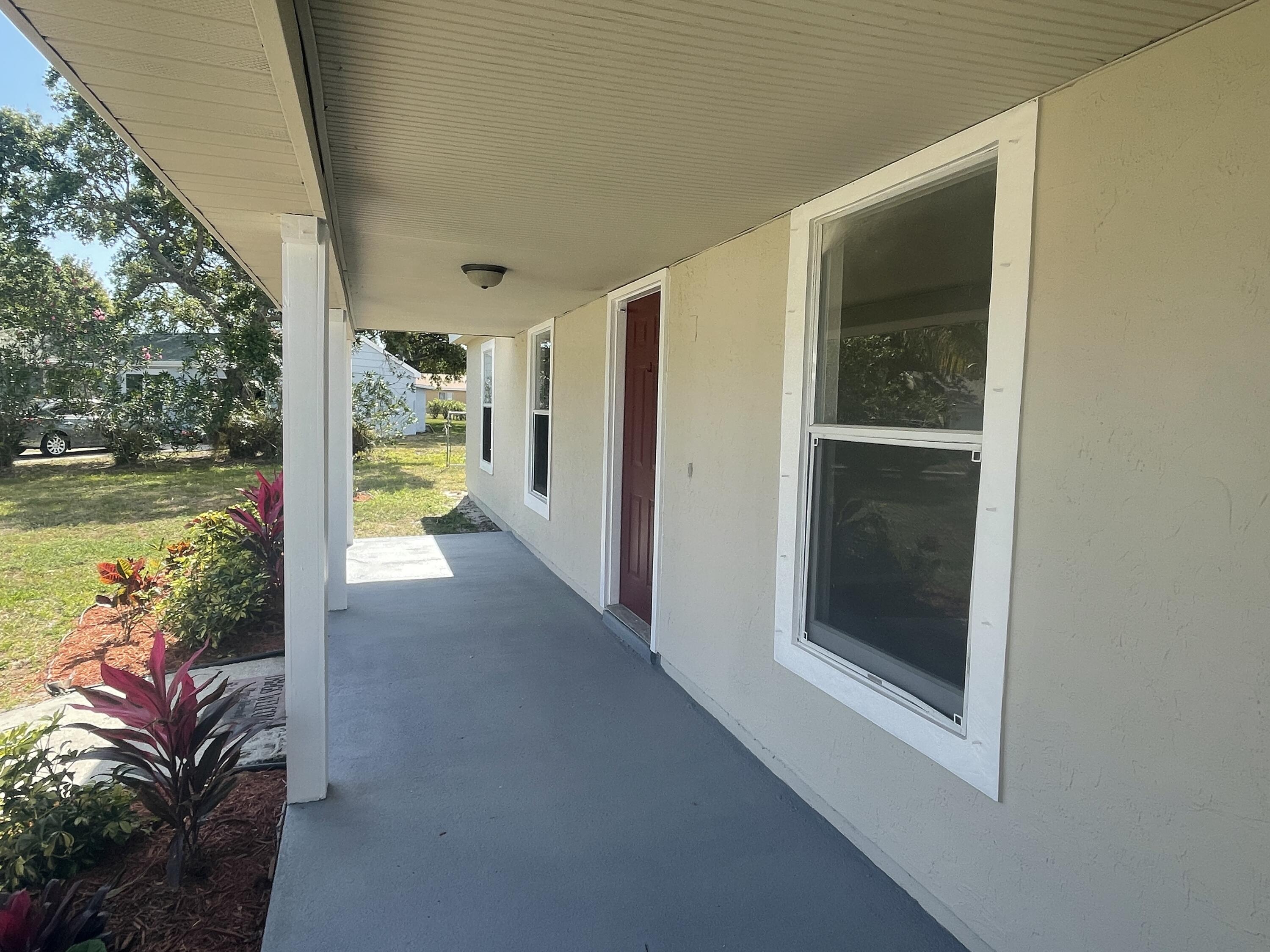 412 Southwest Ruffner Court Port St. Lucie, FL 34953 - Photo 3 of 27 IMG_7299