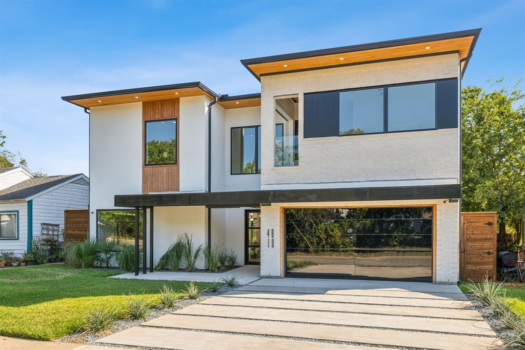 4610 Kelton Drive Dallas, TX 75209 - Photo 1 of 1 a front view of a house with a yard