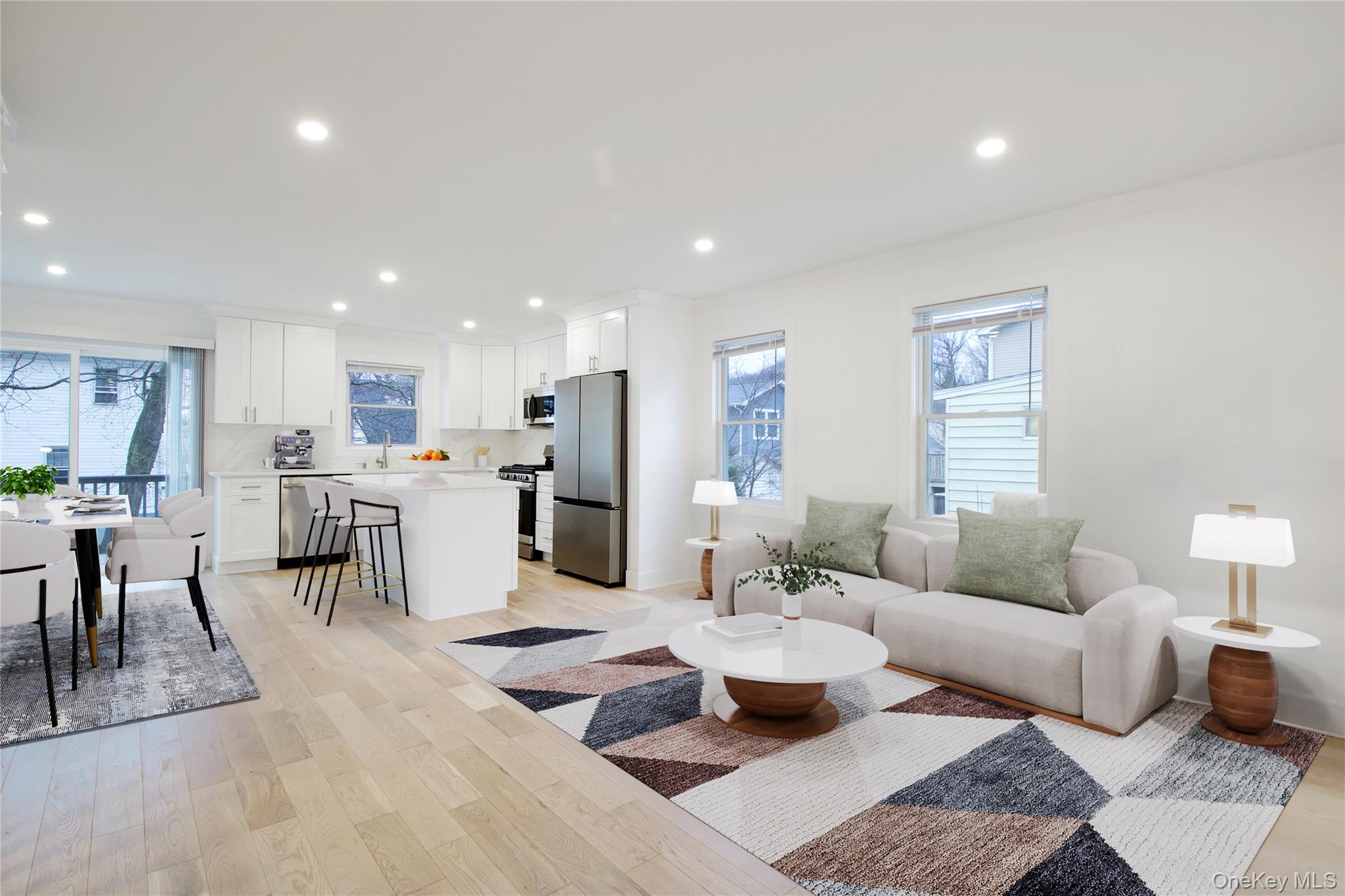56 Kirkwood Road Port Washington, NY 11050 - Photo 11 of 46 a living room with furniture kitchen view and a table