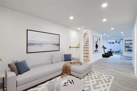 a living room with furniture and a couch