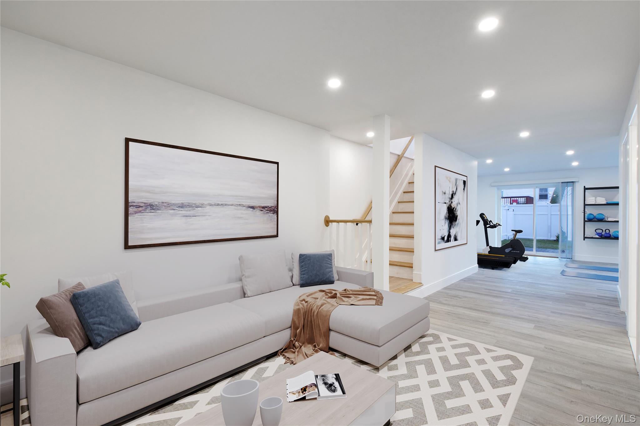 56 Kirkwood Road Port Washington, NY 11050 - Photo 18 of 46 a living room with furniture and a couch