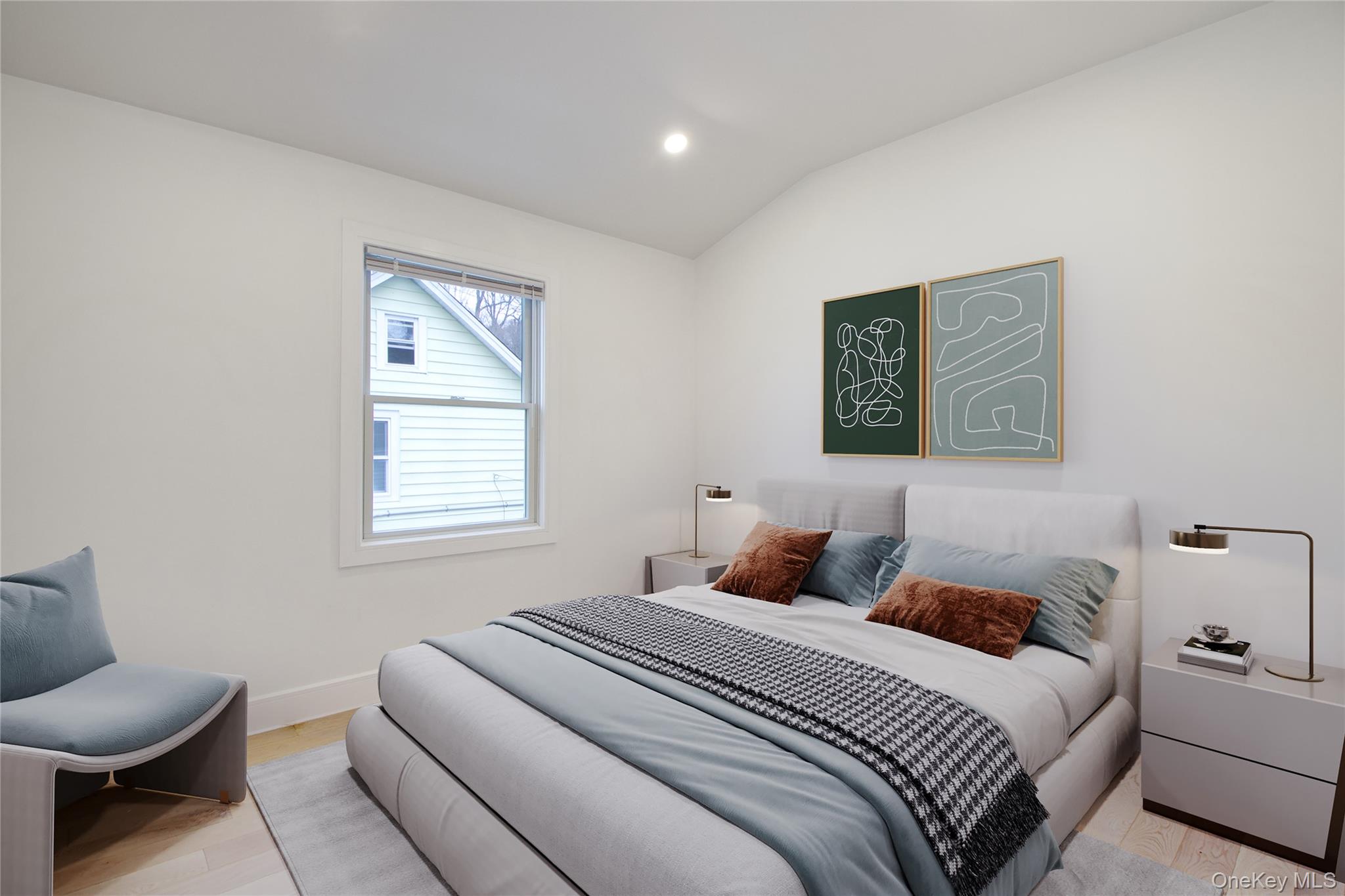 56 Kirkwood Road Port Washington, NY 11050 - Photo 26 of 46 a bedroom with a bed and a couch